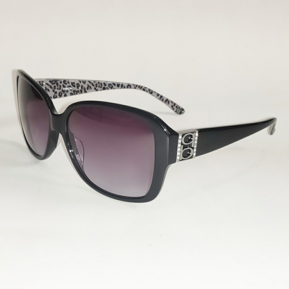 Black Bebe Sunglasses w/ Amethyst lenses.